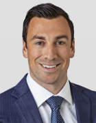 A headshot of Tyler Neenan